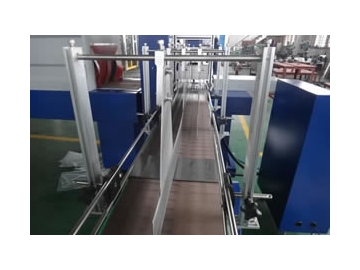 Máquina empaquetadora con film termoretráctil automática