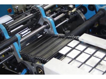 Maquina recubridora de imprimación