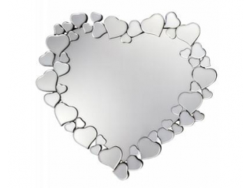 Espejo con forma de corazón con marco de aglomerado