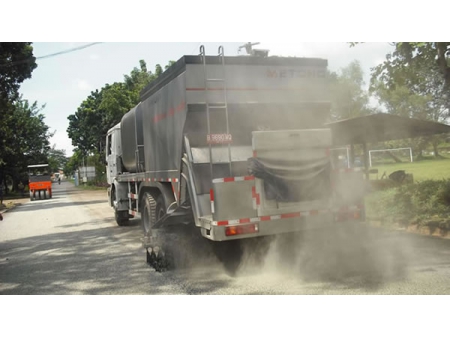 Distribuidor y equipo esparcidor de sello sincronizado