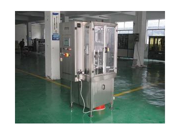 Máquina llenadora y envasadora rotativa