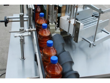 Etiquetadora de etiquetas autoadhesivas y cola húmeda para botellas redondasTN-120B