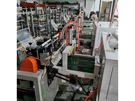 Máquina para hacer guantes de plástico controlada por computadora