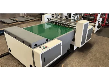 Máquina cortadora y ranuradora para separadores de cartón