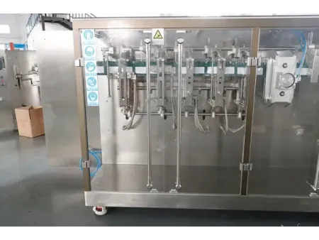 Envasadora horizontal de bolsas stand up con zipper, llenado con 2 boquillas