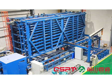 Sistema automatizado de almacenamiento y estantería para la prefabricación de carretes de tubería